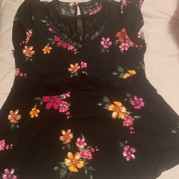 torrid Tops - Torrid peplum floral top.